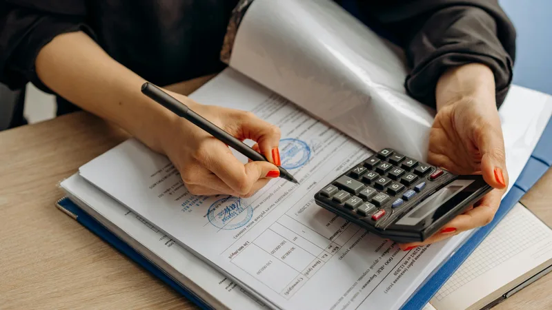 ATO audit notice on desk with pen representing common tradie tax deduction mistakes including home-to-work travel and private vehicle use
